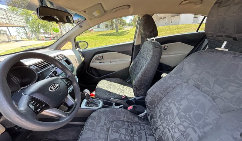 
								KIA RIO LX completo									