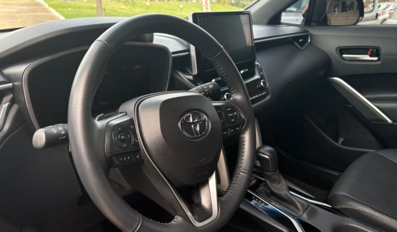 
								TOYOTA Corolla Cross SEG 2.0 ECVT completo									